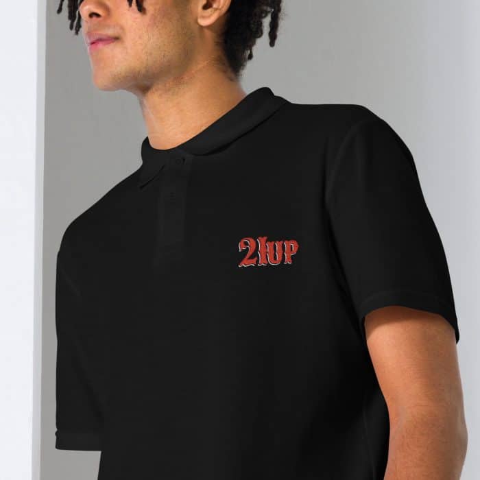 Unisex Pique Polo Shirt Black Zoomed In 64be4aaec9832.jpg